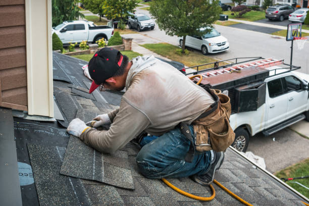 Professional Roofing technician working in Shelley, ID